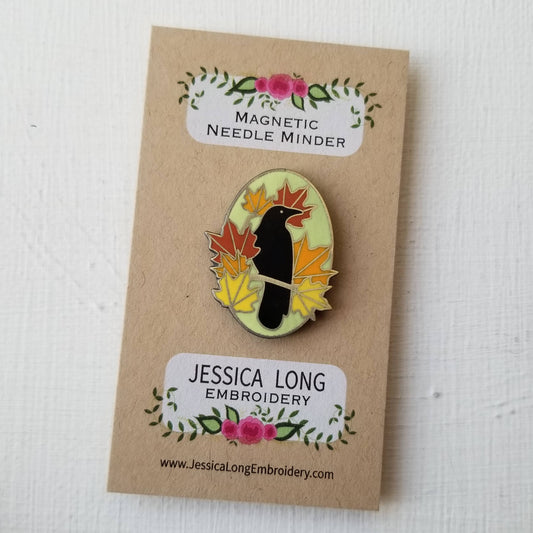 Autumn Crow Needle Minder – Enamel Companion for Stitching Season